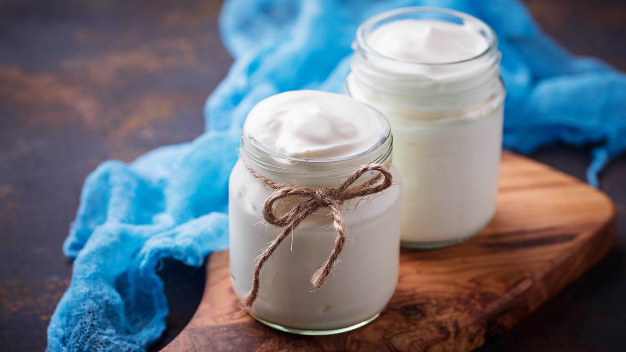 natural greek yoghurt in glass jars